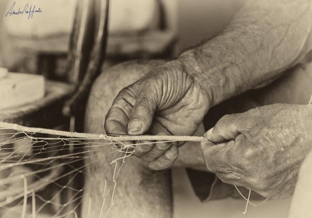 Fisherman-trani-village-closeup-monochrome-black-white-italian-hands